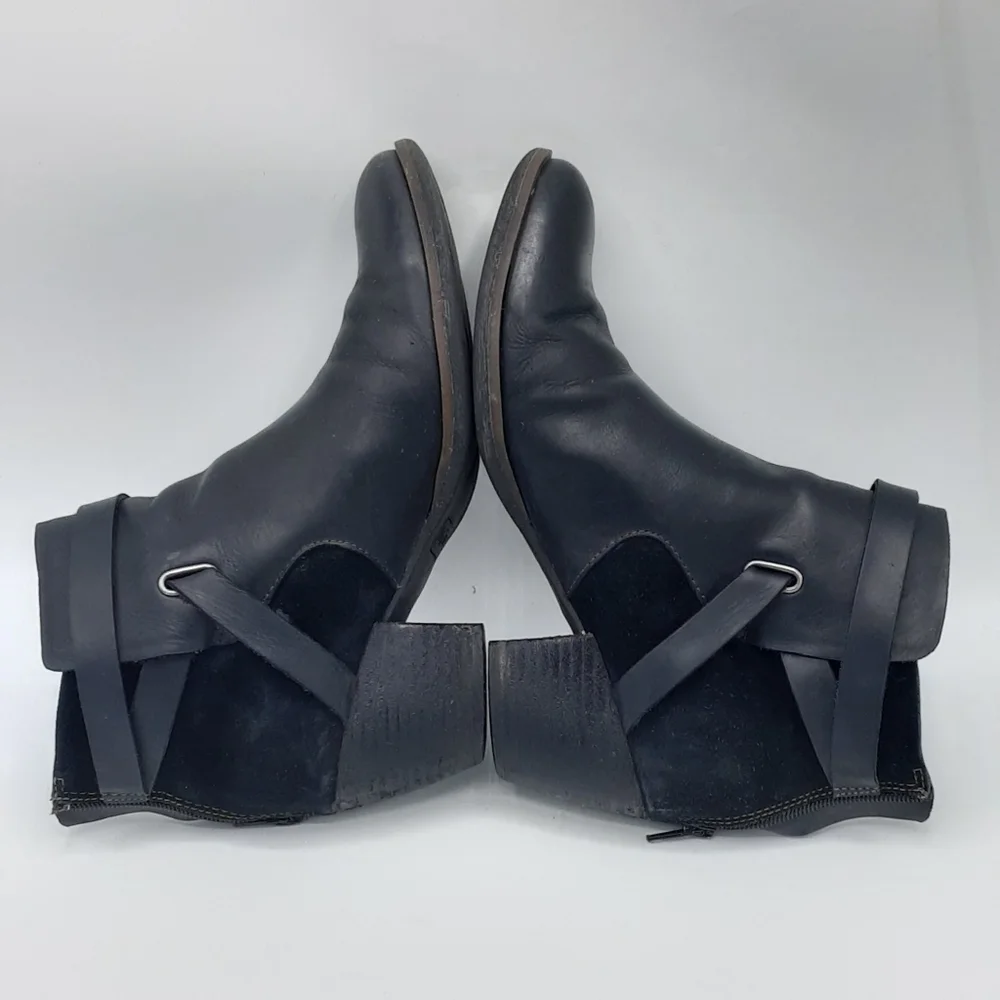 Korks Women's Rohit Black Leather Booties with Buckle Strap